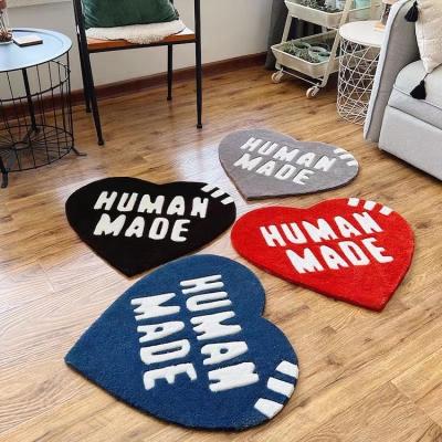 China Beautiful Rabbit Heart Shape Carpet Hand Logo Non-Slip Red Custom Tufted Carpet Commercial Blankets for sale