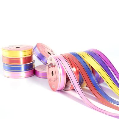 China Eco-friendly 18mm*10M China Fashion PP Ribbon With Gold Line For Decoration for sale