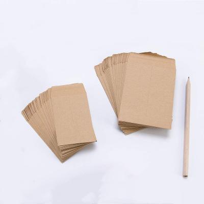 China Recycled Materials Kraft Paper Coin Self Adhesive Envelopes Custom Design Stamp Storage Invitation Envelopes for sale