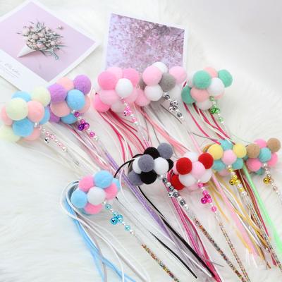 China Viable Retractable Colorful Cat Puzzle Stick Toys Interactive Feather Puzzle Magic Wand Toy for Kitten Cats for sale