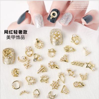 China Fashionable Hot Style Alloy Nail Art With Diamond Pearl Nail Art Metal Nail Art Decorations for sale