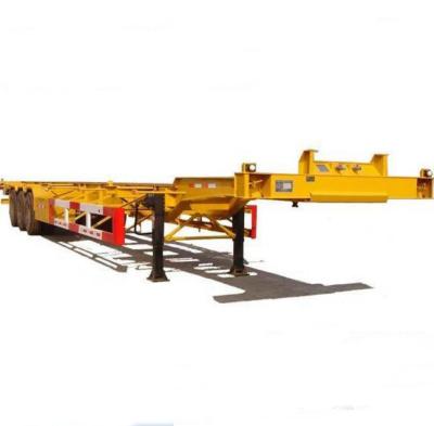 China Factory Price 3 Axle 4 Axle 40ft Flatbed Lowbed Semi Trailer Truck Trailer 50 Tons For Container Transport for sale