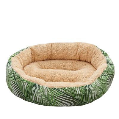 China Multicolor Cake Fleece Travel Sheep Warm Non-slip Bottom Dog and Cat Bed Positive and Nest Pet Negative Dual-use Round Small Sofa Bed for sale