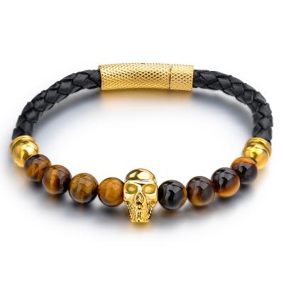 China Trendy Fashion Tiger Eye Stone Bead Gold Skull Charm Leather Bracelet For Men, Mens Bracelets Skull Jewelry for sale