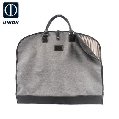 China Durable Customized Logo Canvas Travel Wholesale Manufacturer Storage Bag Suit Cover Travel Wedding Fabrics Garment Bags for sale