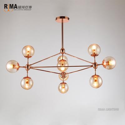 China Rima Lighting New Model Modern Simple Nordic Chandelier Ceiling Indoor Fancy Rose Gold Pendant Light with Glass Ball for sale