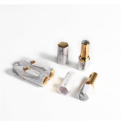 China Cosmetic Packaging In Diy Packaging Diameter 12.1Mm Stock Cosmetic Hexagon Marble Lipstick Tube Beautify Empty Lip Balm Tube for sale