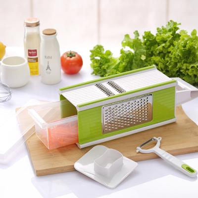 China Viable Kitchen Multifunctional Vegetable Chopper Cheese Grater Slicer With Storage Container Box for sale