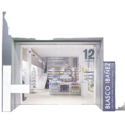 China Wall Mounted Display+storage Retail Pharmacy Design Pharmacy Display Rack Glass Medicine Display Stands for sale