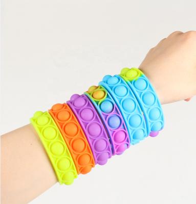 China Factory direct sales decompression silicone children's toys portable press colorful bracelet HY65 for sale