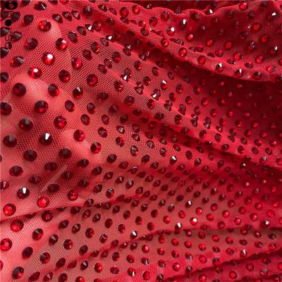 China Bling bling sparkle red rhinestone Mesh Tulle Lace Fabric high quality stretchy elastic net made to order for sale