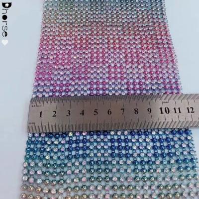 China Bling Bling Glitter DIY Wholesale Custom Rhinestone Mesh Material Plastic Trimming for sale