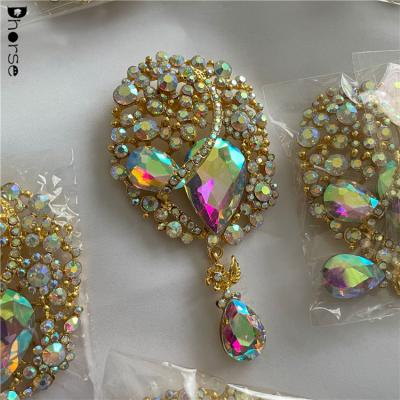 China Luxury High Quality Crystal Rhinestone Brooches Gold Glitter AB Luxury Women for sale