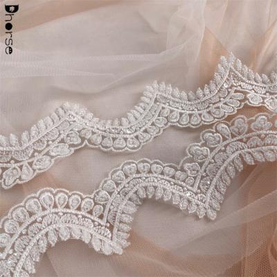 China Custom Made Fancy White Beaded 100% Polyester Embroidery Lace Trim 6cm Viable for sale