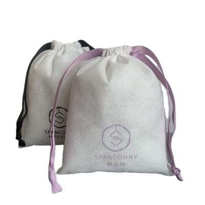 China Recyclable White Cheap Non Woven Jewelry Packaging Bag Drawstring Gift Non Woven Bag With Logo for sale