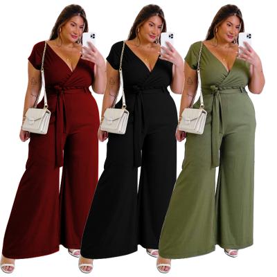 China 2021 newcomers summer fashion solid loose oversize QUICK DRY waistband long v-neck jumpsuit romper women clothes for sale