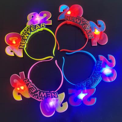 China 2022 Light Up Happy New Year PLASTIC LED Headband Fiber Optic Flashing Headband With Crown Party Costume for sale