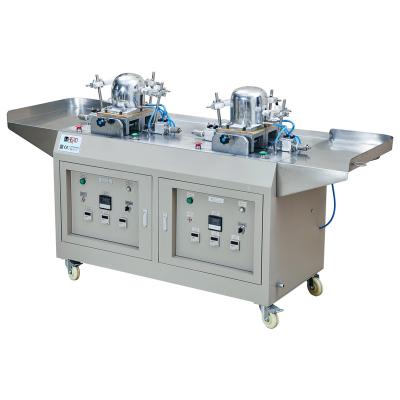 China Manufacturing Plant AUTOMATIC CAP IRONING MACHINE DOUBLE HEADS for sale