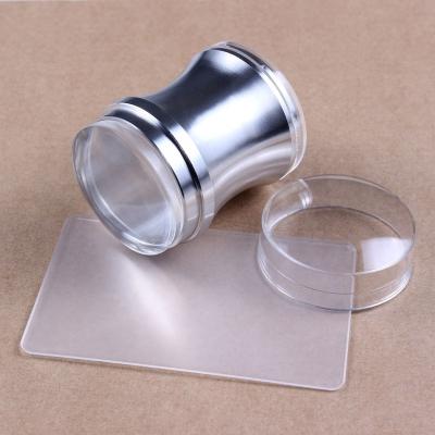 China Professional Good Quality Metal Salon Silver Clear Silicone Nail Puncher And Big Size Scraper DIY Nail Polish Nail Puncher for sale