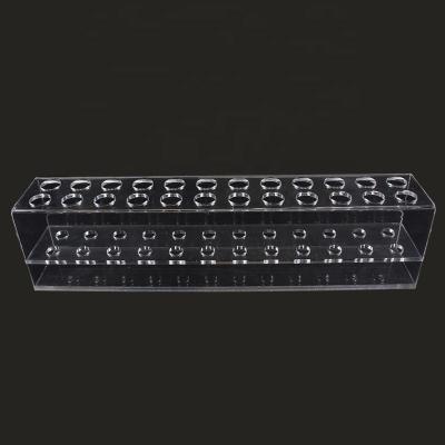 China Ideal Wholesale Goods Acrylic Nail Brush Rack Display Racks Cosmetic Eye Liner Rack Display 24 Holes for sale