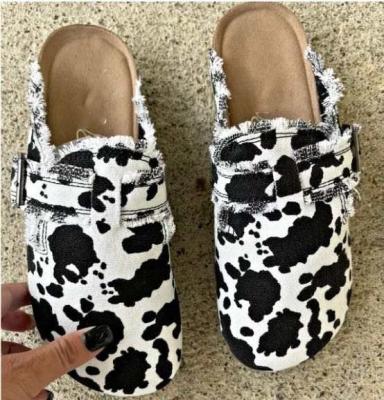 China 2023 Hot Selling Fashionable Casual Flat Canvas Flat Slippers Cow Leopard Print Half Slippers Shoes For Women for sale