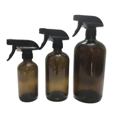 China Personal Care 500ml 16oz Boston Round Amber Glass Bottle With Trigger Spray For Cleaner And Essential Oils for sale