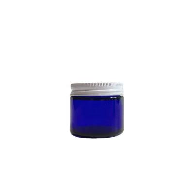 China Personal Care 2oz 60ml Cobalt Blue Straight Sided Round Glass Cream Jar With White Metal Screw Lid for sale