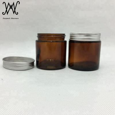 China Personal Care Jar 100ml 100g Amber Glass Straight Sided Round With Silver Metal Lid for sale