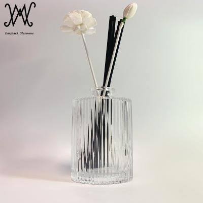 China Personal Care 200ml 210ml Refillable Ribbed Carving Perfume Aroma Diffuser Glass Bottle With Black Rattan Stick for sale