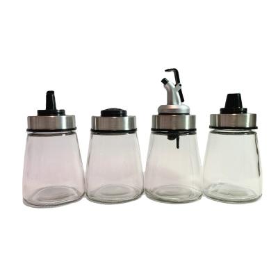 China Freshness Preservation Salt And Pepper Shaker Set Jar Seasoning Bottle Stainless Steel Premium Glass Sleeve Food Grade for sale