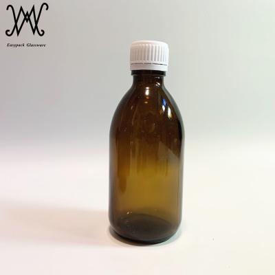 China Pharmaceutical 250ml Cough Syrup Bottle Amber Glass Packaging With Black Plastic Metal Cap Wholesale for sale