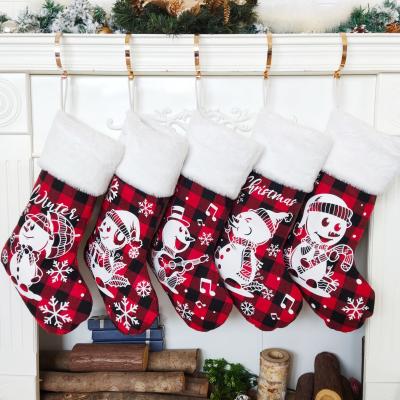 China 2021 New Design Cotton Grid Christmas Snowman Original Red Black Fireplace Stocking Hanging Decoration for sale