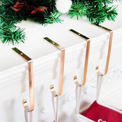 China Gold Metal Design Non-slip Christmas Stocking Holder Hanger Hooks Chimney J Style for sale