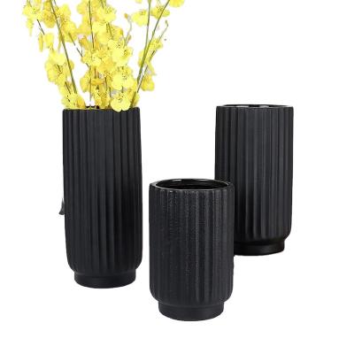 China 2021 new modern simple ceramic vase table black vertical vase decoration for sale