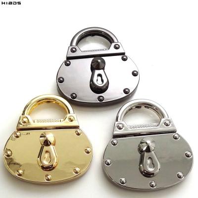 China Brass Metal Push Release Handbag Twist Lock Hardware Accessories Manufacturer HIBOS GRS for sale