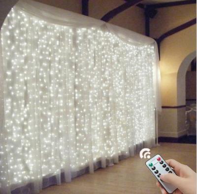 China Colorful LED Decoration Twinkle String Light Fairy Star 300 Led Window Curtain String Light for sale