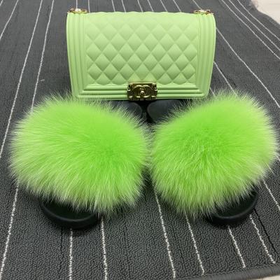 China Fashion trend latest design women fur slippers fur slides with purse set fur slides and matching purse for sale