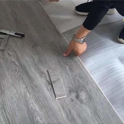 China Interlocking PVC SPC Flooring Vinyl Tiles Vinyl Plank Flooring For Garage Floor for sale