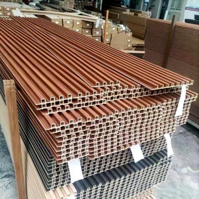 China Wood Color And Marble Color Environmentally Friendly Indoor Wood Plastic Wood Grain PVC Interior Decorative Wall Panel en venta