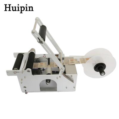 China Lowest price food lighter oil bottle beer table top self adhesive labeling machine for plastic bottles for sale