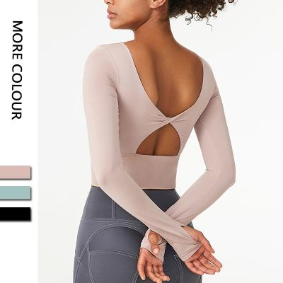 China New Arrival Antibacterial Gym Activewear Long Sleeves Solid Yoga Jacket Yoga Top With Chest Pad for sale