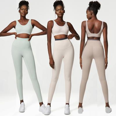 China Antibacterial Wholesale Solid Color Workout Sets Women Seamless Yoga Set Gym Fitness Set for sale