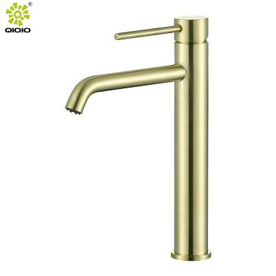 China Hot Cold Mixed Gold 304 Single Handle Bathroom Basin Faucet Modern Deck Mounted Faucet Stainless Steel Faucet for sale