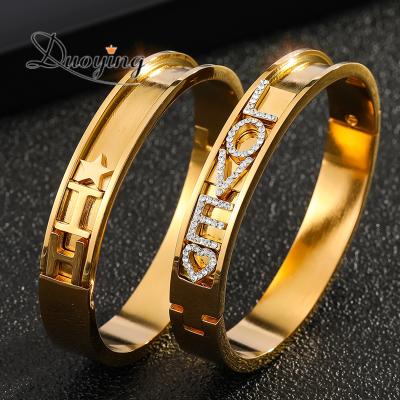 China Custom Movable Initial Name Letter Bracelets With Zircon Stainless Steel Bangle Gold Plated Bangle Custom Name Bangle for sale