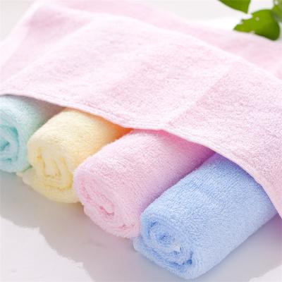 China Solid Color Compressed Yarn Dyed Dobby Face Towels Embroidered Bamboo Organic Bamboo Clean Towel for sale