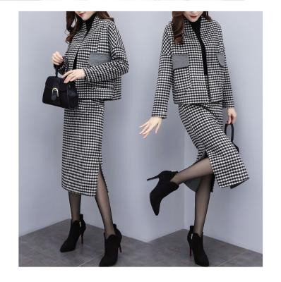 China 2021 New Viable Women Fall Winter Set Cloth Skirt Woolen Leisure Fashionable Sets Long Sleeve Two Piece Set for sale