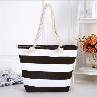 China 2021 Hot Selling Fashion Beach Bag Tote Handbag Perforated Bags For Women for sale