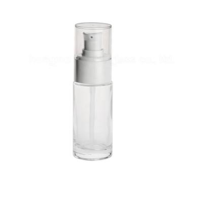 China Luxury Lotion Recyclable Round 30ml 30ml Flat Material Shoulder Frosted Clear Glass Bottle Bottles With White Plastic Pumps For Cosmetics Packaging for sale