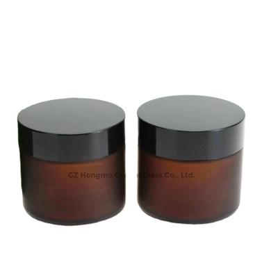 China 60g 60ml Recyclable Material Amber Frosted Glass Cosmetic Glass Cream Bottle Wholesale 2Oz Jar Costom Containers With Lids for sale