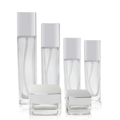 China Wholesale Cosmetic Recyclable Glass Set 20g 50g 30ml 50ml 100ml 120ml Clear Square Pump Packaging Bottles And Glass Cream Jars For Skin Care for sale